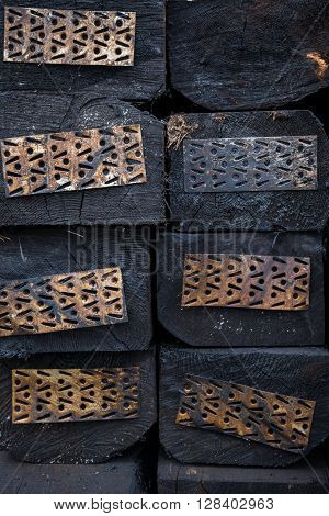 Wooden Railway sleepers in a pile with metal