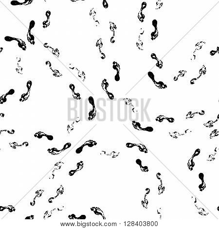 Black prints of bare human foots isolated on white seamless pattern