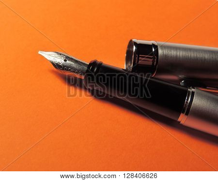 Elegant, silver fountain pen and copy space