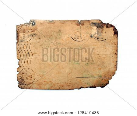 Reverse side of retro worn postcard with burnt corners