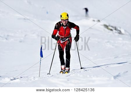 FAGARAS ROMANIA - MARCH 5: Ski mountaineer competes during the Ski Mountaineering National Competition in Fagaras Mountains on March 5 2016 in Romania.