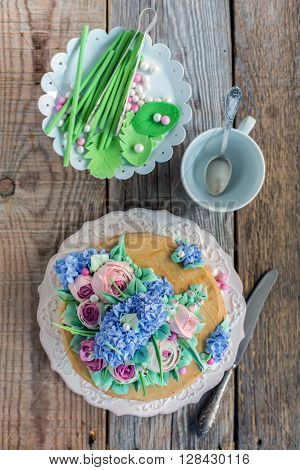 Dish With Cake And Decorative Elements From Sugar Mastic.