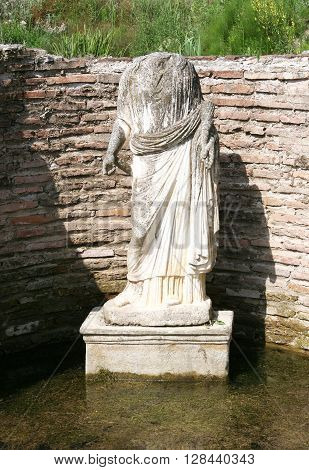 The statue of the goddess Isis Tyche. Archaeological park Dion. Greece