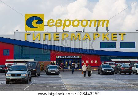 GOMEL BELARUS - APRIL 14 2016: Unidentified people go to the hypermarket Euroopt on the street Khatayevich Gomel Belarus