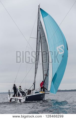 KYIV, UKRAINE - APRIL 26, 2016: Traning on the new model of yacht OceanTECH L30 on the Kyiv water reservoir or Kyiv SEA with Rodion Luka, L30 idea author, Silver medalist.