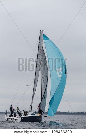 KYIV, UKRAINE - APRIL 26, 2016: Traning on the new model of yacht OceanTECH L30 on the Kyiv water reservoir or Kyiv SEA with Rodion Luka, L30 idea author, Silver medalist.