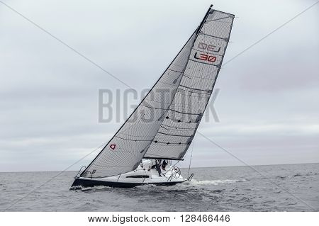 KYIV, UKRAINE - APRIL 26, 2016: Traning on the new model of yacht OceanTECH L30 on the Kyiv water reservoir or Kyiv SEA with Rodion Luka, L30 idea author, Silver Olympic medalist.