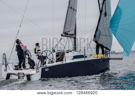 KYIV, UKRAINE - APRIL 26, 2016: Traning on the new model of yacht OceanTECH L30 on the Kyiv water reservoir or Kyiv SEA with Rodion Luka, L30 idea author, Silver Olympic medalist.