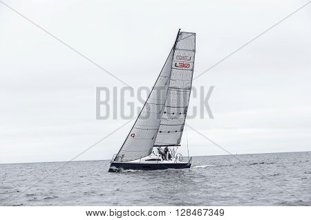KYIV, UKRAINE - APRIL 26, 2016: Traning on the new model of yacht OceanTECH L30 on the Kyiv water reservoir or Kyiv SEA with Rodion Luka, L30 idea author, Silver Olympic medalist.
