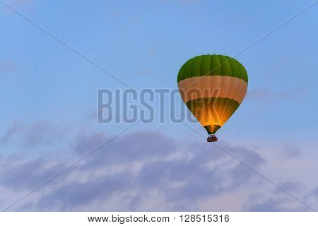 Balloon silhouette in the sunrise sky. Cappadocia, Turkey