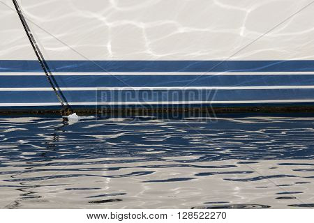 CAGLIARI: Marina Piccola Marina - reflections of a small boat on the sea - Sardinia