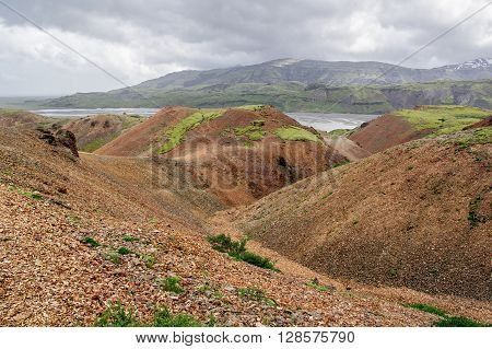 Icelandic landscape with red hills in Lonsoraefi