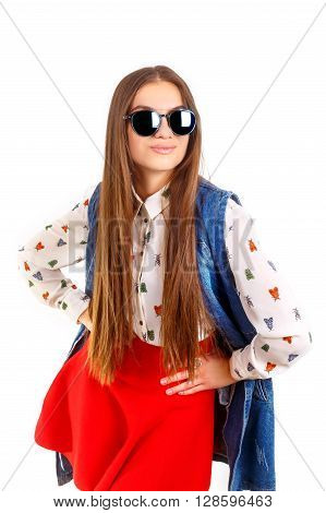 Vogue fashion model woman posing in red mini skirt on white studio background