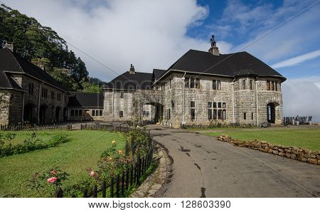 HAPUTALE, SRI LANKA - JAN 01 2016: Adisham bungalow is a tourist attraction located on a mountain top in Tangamalai, Haputale, Sri Lanka which is also a monastery run by Benedictine priests.