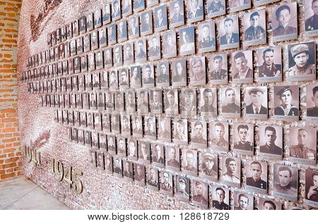 NIZHNY NOVGOROD, RUSSIA - AUGUST 28, 2015: Mosaic from the old front-line of photos on the Kremlin wall.
