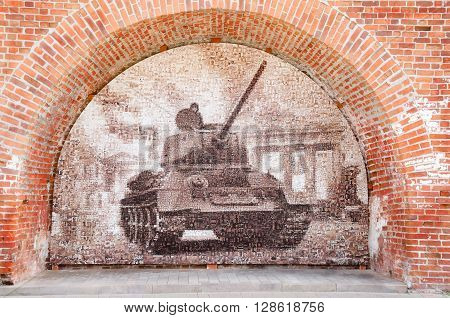 NIZHNY NOVGOROD, RUSSIA - AUGUST 28, 2015: The legendary T-34 tank. Mosaic of old frontline photos.