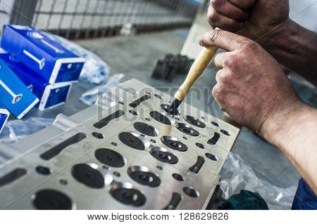 Hands Repairing A Car Engine With A Wrench