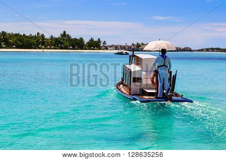 Maldivian boat on blue lagoon, indian ocean