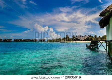 Maldives island - sandy beach and indian ocean