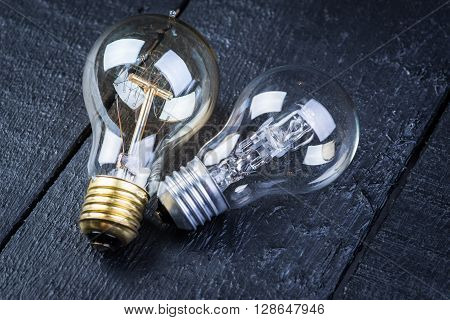 Tungsten Bulbs On A Black Wooden Table