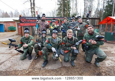 Saint-Petersburg, Russia - April 24, 2016: Paintball tournament in Snaker club between student teams from five universities. Group photo.