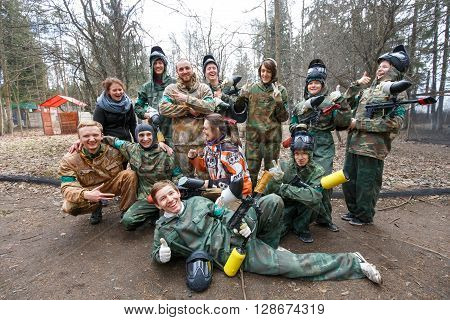 Saint-Petersburg, Russia - April 24, 2016: Paintball tournament in Snaker club between student teams from five universities. Group photo.