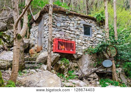 Stone forester's hut in the mountain forest