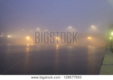 Umberto I Bridge in Turin Italy in the fog