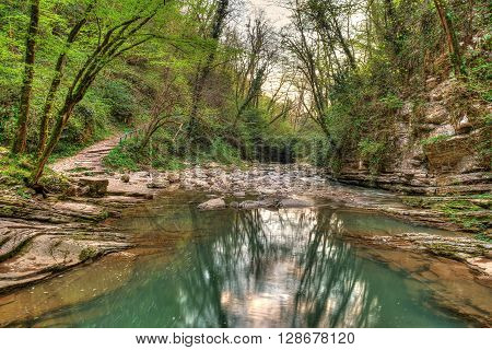 Agura River in mountain forest in Sochi Russia. HDR processing