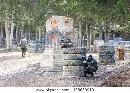 Saint-Petersburg, Russia - April 24, 2016: Paintball tournament in Snaker club between student teams from five universities. Game process.