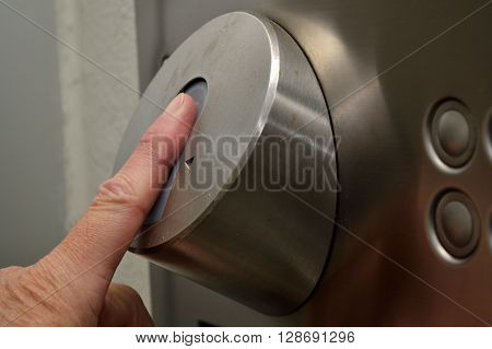 Forefinger is held on scan - closeup