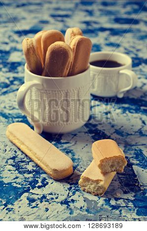 Homemade traditional italian cookie savoiardi. Selective focus