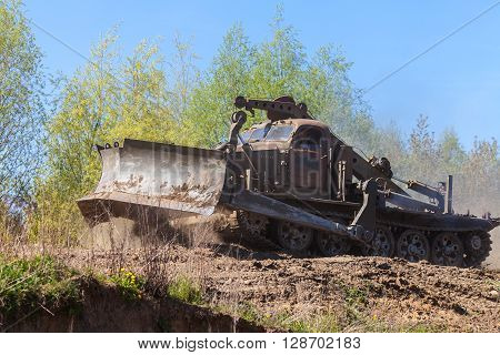 GRIMMEN/ GERMANY - MAY 1: soviet BAT - M military bulldozer drives on track on a motortechnic festival on may 1 2016 in grimmen / Germany.