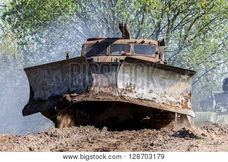 GRIMMEN/ GERMANY - MAY 1: soviet BAT - M military bulldozer drives on track on a motortechnic festival on may 1 2016 in grimmen / Germany.