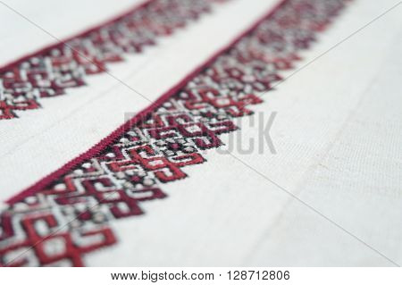 fragment of embroidery on the homespun cloth