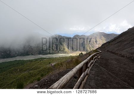 path to the vesivius volcano with clouds in south Italy