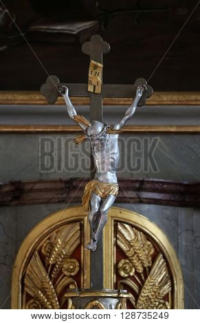 PRIMISWEILER, GERMANY - OCTOBER 20: Crucifixion, church of St. Clement in Primisweiler, Germany on October 20, 2014.