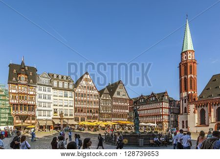 People At Roemerberg, A Row Of Half-timbered Houses At The East Side Square Known As The Ostzeil