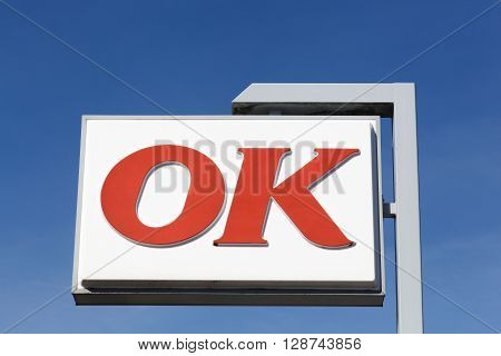 Agri, Denmark - May 5, 2016: OK gas station logo on a pole. OK is the biggest selling petrol brand in Denmark.
