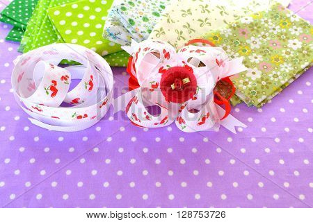 Beautiful bright bow of ribbon, children hair accessory, fabric set