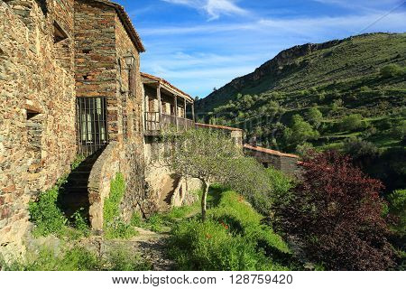 Stone house just across the road in the village of Patones above. Madrid. Spain