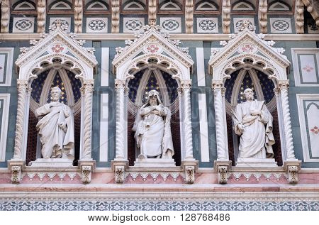 FLORENCE, ITALY - JUNE 05: Statues of the Apostles and the fine architectural detail of the of the, Portal of Cattedrale di Santa Maria del Fiore, Florence, Italy on June 05, 2015