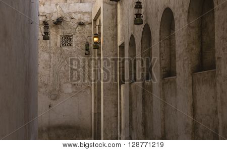 A narrow passage of an old building. Rustic Islamic architectural details.