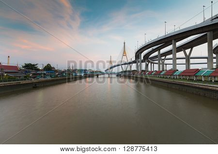 Suspension bridge cross over Bangkok main river with beautiful sky background, Thailand landmark