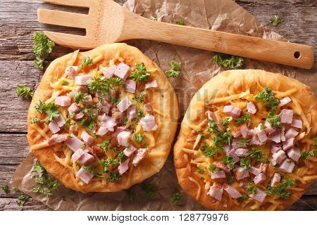 Hungarian Pancakes Langos With Ham And Cheese On The Table. Horizontal Top View
