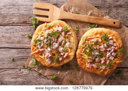 Homemade Hungarian Langos With Ham And Cheese Close-up. Horizontal Top View