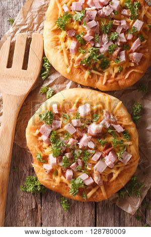 Hungarian Pancakes Langos With Ham And Cheese On The Table. Vertical Top View