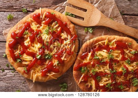 Tasty Langos With Cheese And Ketchup Close-up. Horizontal Top View