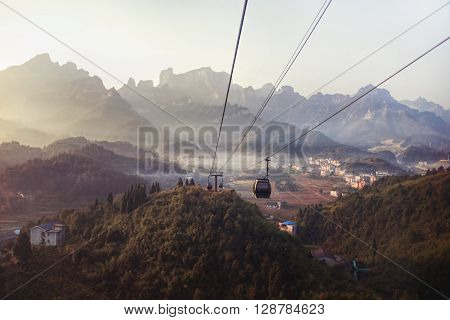 Tianmen Shan cable car is the longest cable car ride in the world covering a distance of 7455 meters. The car runs from Zhangjiajie downtown up to Tianmen Shan