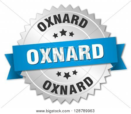 Oxnard round silver badge with blue ribbon